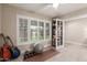 Exercise room with yoga ball, weights, and built-in shelving at 8435 E Catalina Dr, Scottsdale, AZ 85251