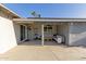 Covered patio with seating area, adjacent to house at 8435 E Catalina Dr, Scottsdale, AZ 85251