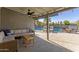 Covered patio with seating area overlooking the pool at 8435 E Catalina Dr, Scottsdale, AZ 85251