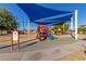 Playground area with shade and play equipment at 8435 E Catalina Dr, Scottsdale, AZ 85251