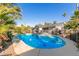 Relaxing kidney-shaped pool in backyard at 8435 E Catalina Dr, Scottsdale, AZ 85251