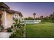 Spacious backyard oasis with a pool and lush landscaping at 8601 N 64Th Pl, Paradise Valley, AZ 85253