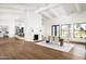 Bright dining area with hardwood floors and a large window at 8601 N 64Th Pl, Paradise Valley, AZ 85253