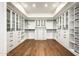 Large walk-in closet featuring built-in shelves and drawers at 8601 N 64Th Pl, Paradise Valley, AZ 85253