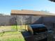 Large backyard with grill and grassy area at 8828 E Des Moines St, Mesa, AZ 85207