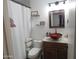 Bathroom with red glass sink and granite vanity at 8828 E Des Moines St, Mesa, AZ 85207