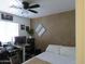 Bedroom with double bed and workspace at 8828 E Des Moines St, Mesa, AZ 85207