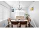 Dining room features a table with four chairs and a bench at 8828 E Des Moines St, Mesa, AZ 85207