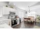 Bright kitchen with stainless steel appliances and breakfast nook at 8828 E Des Moines St, Mesa, AZ 85207