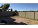 Small backyard with block wall, small patio, and desert landscaping at 9420 S 35Th Gln, Laveen, AZ 85339