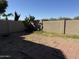 Small backyard with block wall and small patio area at 9420 S 35Th Gln, Laveen, AZ 85339