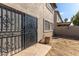 Private backyard with security door and small planter at 9420 S 35Th Gln, Laveen, AZ 85339