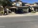 Two-story house with a brown garage door and a landscaped front yard at 9420 S 35Th Gln, Laveen, AZ 85339