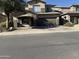 Two-story house with a brown garage door and a landscaped front yard at 9420 S 35Th Gln, Laveen, AZ 85339