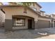 Two-story house with a brown garage door and desert landscaping at 9420 S 35Th Gln, Laveen, AZ 85339