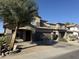 Two-story house with a brown garage door and a landscaped front yard at 9420 S 35Th Gln, Laveen, AZ 85339