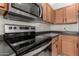 Stainless steel stove and microwave in a well-lit kitchen at 9420 S 35Th Gln, Laveen, AZ 85339