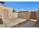 Private backyard with storage and access gate at 948 S Alma School Rd Rd # 89, Mesa, AZ 85210