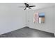 Bright bedroom featuring grey vinyl flooring and ceiling fan at 948 S Alma School Rd Rd # 89, Mesa, AZ 85210