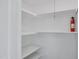 Well-lit pantry with ample shelving for storage at 948 S Alma School Rd Rd # 89, Mesa, AZ 85210