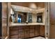 Spa-like bathroom with a large vanity and stone counters at 9839 E Madera E Dr, Scottsdale, AZ 85262