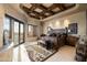 Spacious bedroom with wooden king-size bed, mountain views, and rustic decor at 9839 E Madera E Dr, Scottsdale, AZ 85262