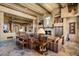 Living room with stone fireplace and southwestern decor at 9839 E Madera E Dr, Scottsdale, AZ 85262