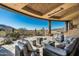 Covered patio with seating area and stunning mountain views at 9839 E Madera E Dr, Scottsdale, AZ 85262