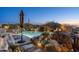 Expansive pool and spa with mountain views, surrounded by desert landscaping at 9839 E Madera E Dr, Scottsdale, AZ 85262