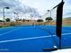 Full view of the community tennis court at 10410 N Cave Creek Rd # 1007, Phoenix, AZ 85020