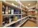 Well-organized pantry with ample shelving for storage at 12424 E Poinsettia Dr, Scottsdale, AZ 85259