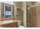 Clean bathroom with a large shower and updated vanity at 12617 W Mine Trl, Peoria, AZ 85383