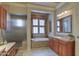 Spa-like bathroom with a soaking tub, walk-in shower, and updated vanity at 12617 W Mine Trl, Peoria, AZ 85383