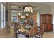 Kitchen breakfast nook with wood table and chairs at 12617 W Mine Trl, Peoria, AZ 85383