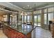 Kitchen island with granite countertop and breakfast bar at 12617 W Mine Trl, Peoria, AZ 85383