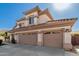 Two-story house with three-car garage and landscaped front at 1435 E Oxford Ln, Gilbert, AZ 85295