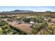 Aerial view of a ranch style home with a large backyard and mountain views at 14705 E Redbird Rd, Scottsdale, AZ 85262
