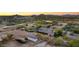 Aerial view of the property with stables and large landscape at 14705 E Redbird Rd, Scottsdale, AZ 85262