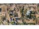 Aerial view of a large estate with stables, riding arena, and main house at 14705 E Redbird Rd, Scottsdale, AZ 85262