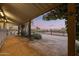 Covered walkway offers sunset views of stables at 14705 E Redbird Rd, Scottsdale, AZ 85262
