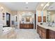 Elegant bathroom with double vanity, soaking tub, and large shower at 14705 E Redbird Rd, Scottsdale, AZ 85262