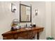 Vanity with copper sink, wooden base, and a large mirror at 14705 E Redbird Rd, Scottsdale, AZ 85262