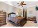 Bedroom with comfortable bed and ceiling fan at 14705 E Redbird Rd, Scottsdale, AZ 85262