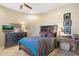 Cozy bedroom with a comfortable bed and dresser at 14705 E Redbird Rd, Scottsdale, AZ 85262