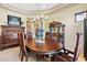 Bright dining area featuring an oval table and ornate chairs at 14705 E Redbird Rd, Scottsdale, AZ 85262