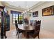 Formal dining room with a round table and dark wood chairs at 14705 E Redbird Rd, Scottsdale, AZ 85262