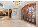 Elegant entryway with double doors and high ceilings at 14705 E Redbird Rd, Scottsdale, AZ 85262