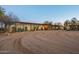 Long house exterior with covered entryway at 14705 E Redbird Rd, Scottsdale, AZ 85262