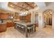 Island kitchen with granite countertops and custom cabinetry at 14705 E Redbird Rd, Scottsdale, AZ 85262