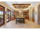 Gourmet kitchen boasts a large island, wood cabinets, and granite countertops at 14705 E Redbird Rd, Scottsdale, AZ 85262